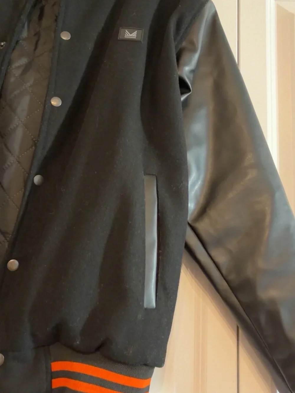 Black Varsity Jacket with Orange Stripe Trim